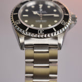 2002 Rolex Submariner 14060M with Roles Service Certificate