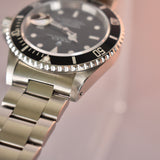 Rolex Submariner 16610 with Service Papers