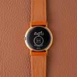 1990s Hermès Dress Watch Burgundy Dial