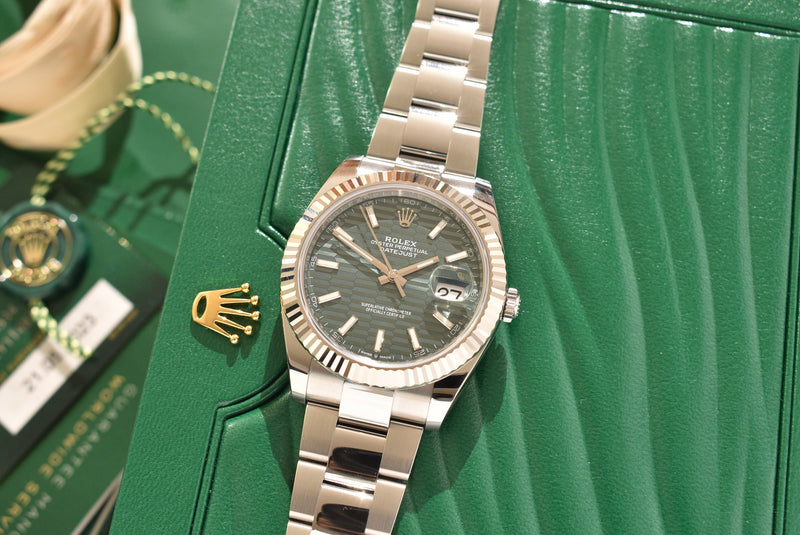 May 2023 Rolex Datejust 126334 Green Motif Brand New Complete Set