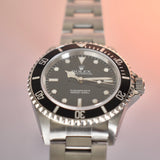 Rolex Submariner 14060 with Service Papers