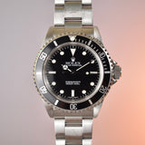 Rolex Submariner 14060 with Service Papers