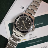 Rolex Submariner 14060 with Service Papers
