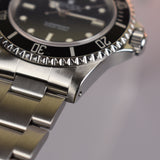 2002 Rolex Submariner 14060M with Roles Service Certificate