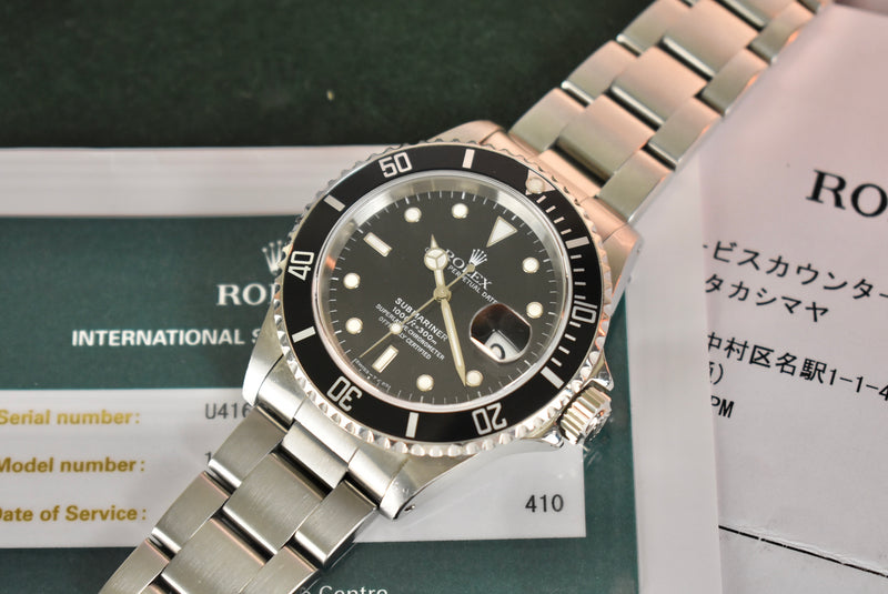 Rolex Submariner 16610 with Service Papers